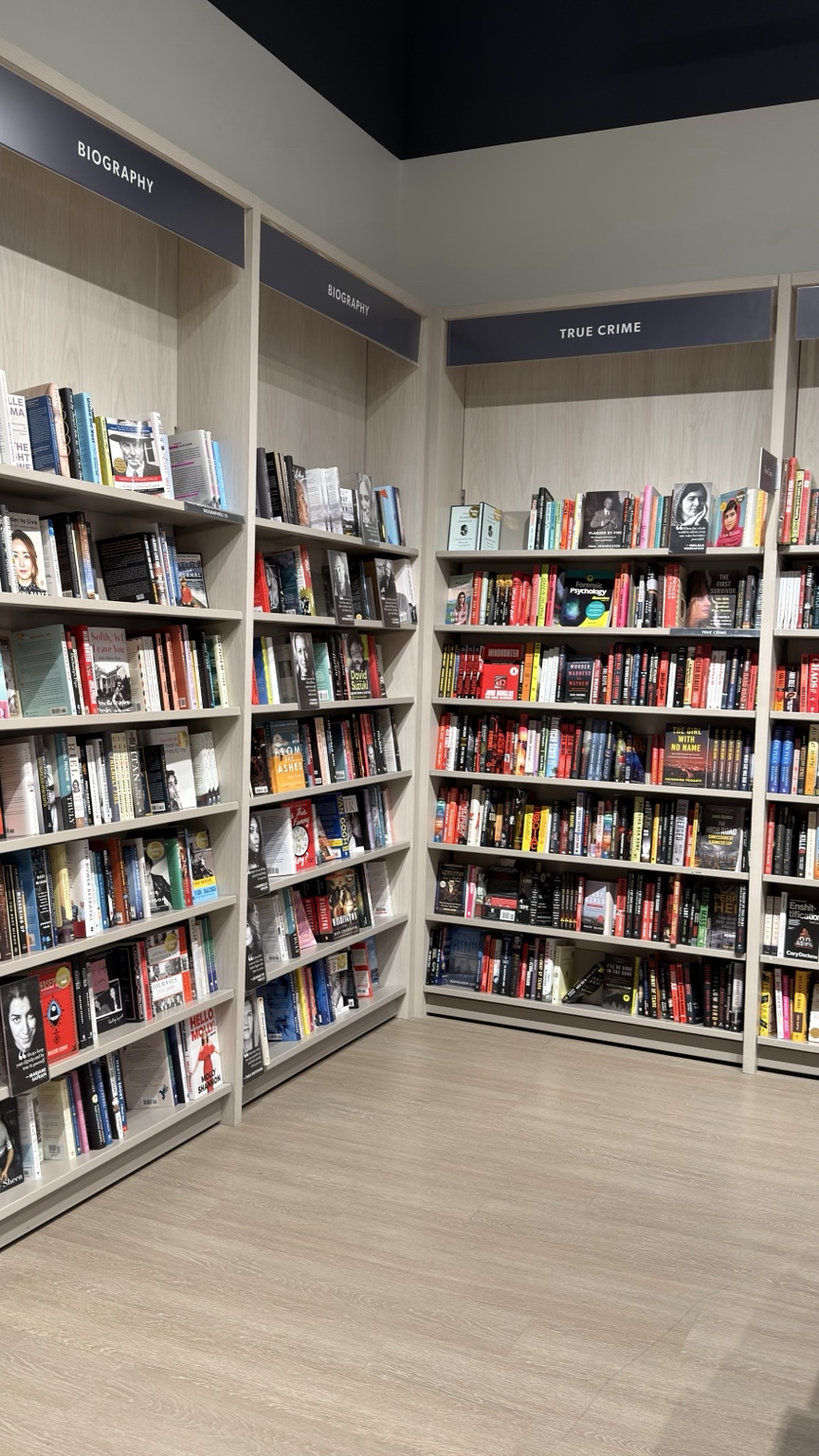 Biography and true crime bookstore sections photographed by Aman